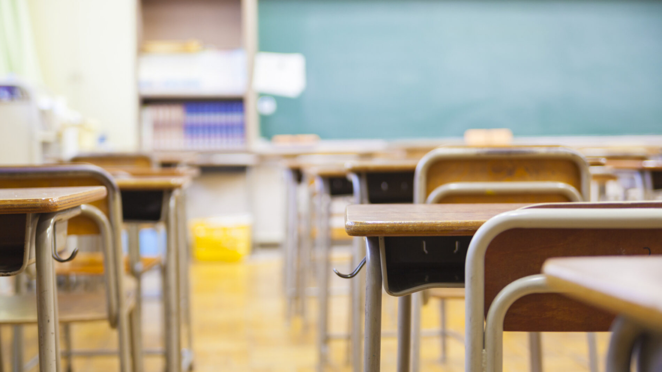 An empty school classroom defocused.